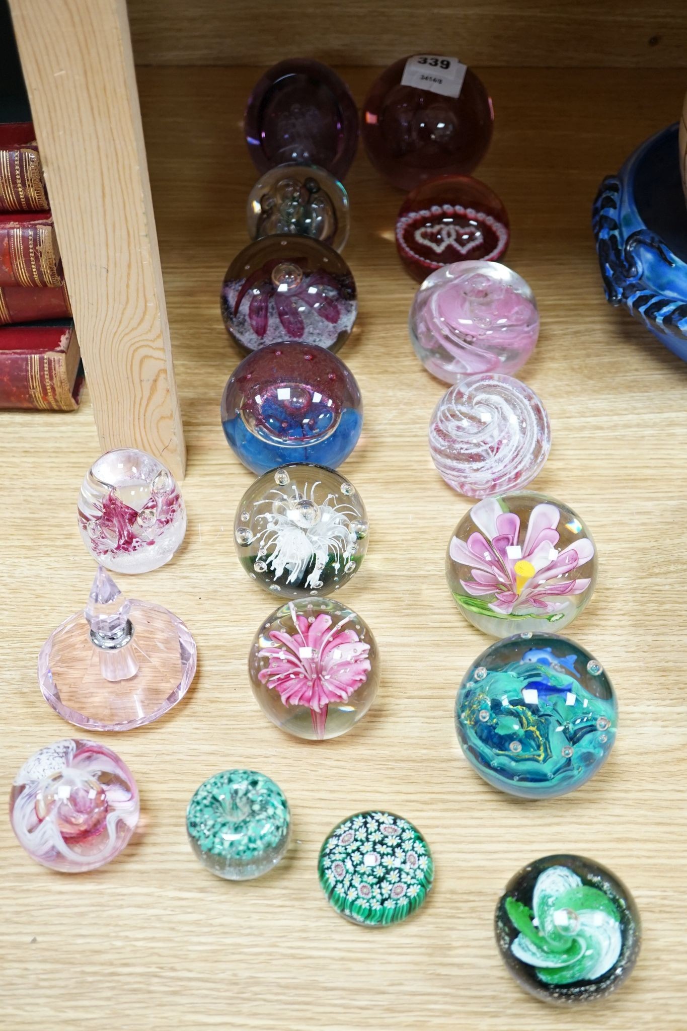 A group of glass paperweights including Caithness